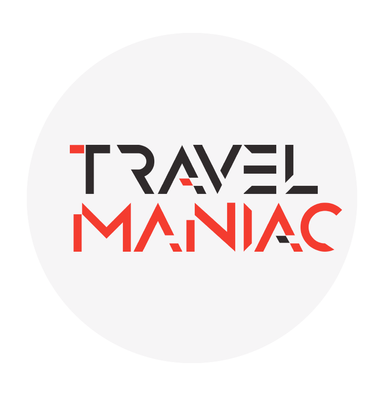 travel maniac meaning